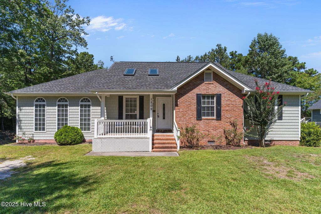 Photo of 1509 Country Club Drive, Hampstead, NC 28443 (MLS # 100527660)