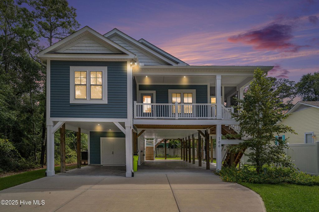 Photo of 106 NW 2nd Street, Oak Island, NC 28465 (MLS # 100527354)