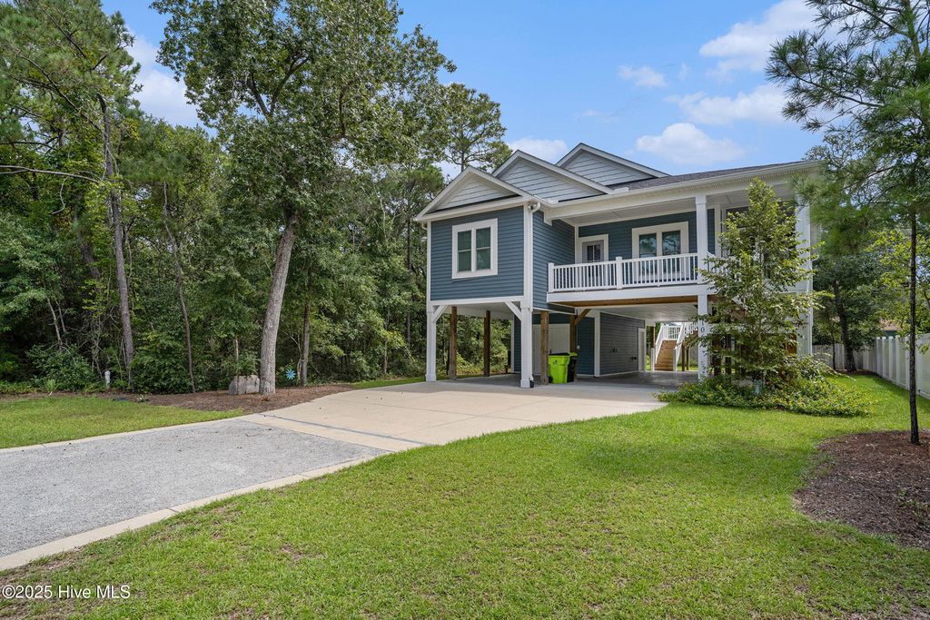 Photo of 106 NW 2nd Street, Oak Island, NC 28465 (MLS # 100527354)