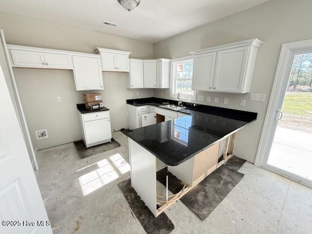 Photo of 304 Broadleaf Drive, Jacksonville, NC 28546 (MLS # 100527049)