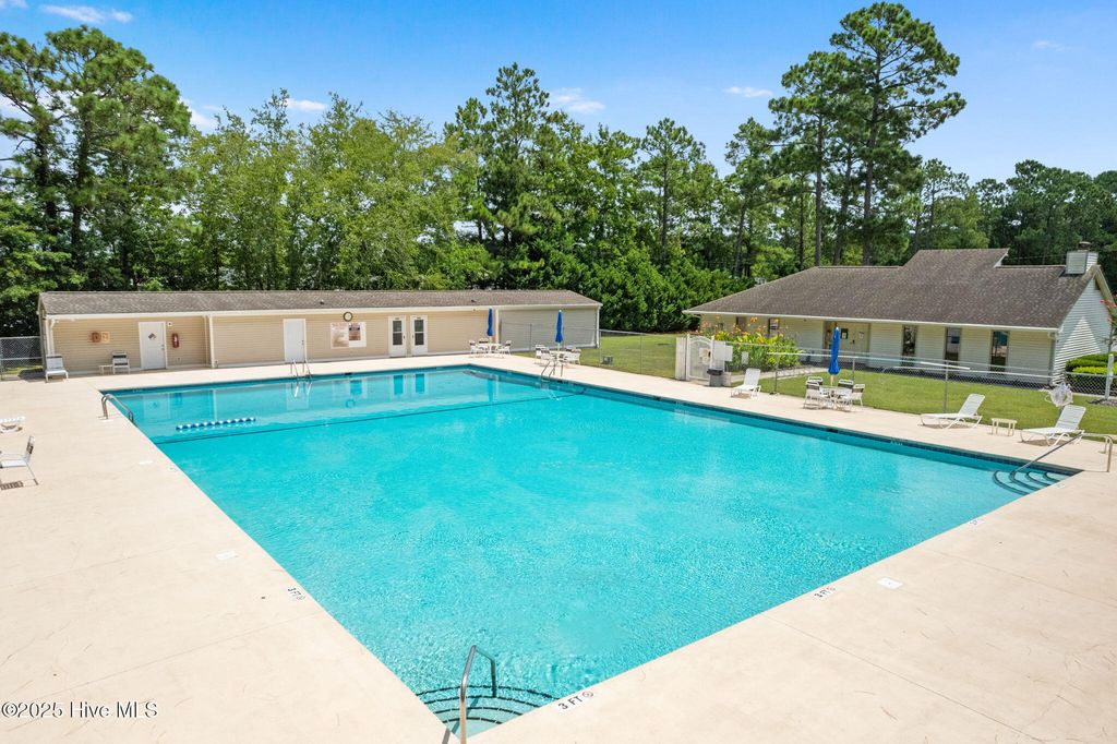 Photo of 411 Boundaryline Drive NW, Calabash, NC 28467 (MLS # 100518745)