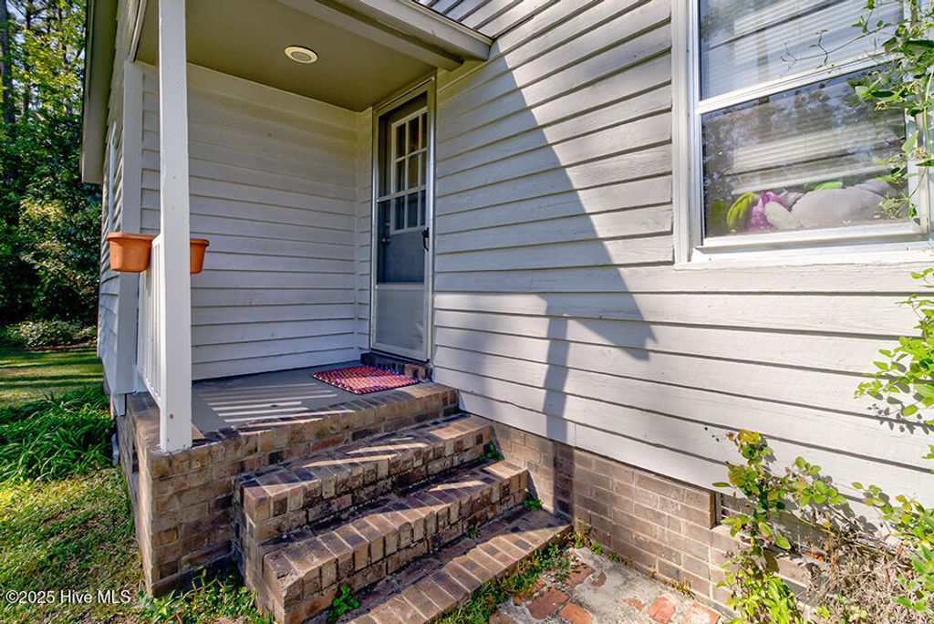 Photo of 1001 Elm Street, Lake Waccamaw, NC 28450 (MLS # 100536887)