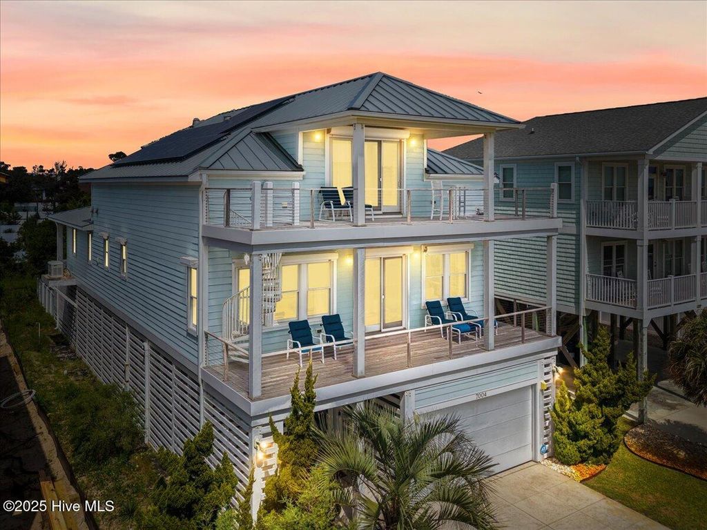 Photo of 7004 E Beach Drive, Oak Island, NC 28465 (MLS # 100530366)
