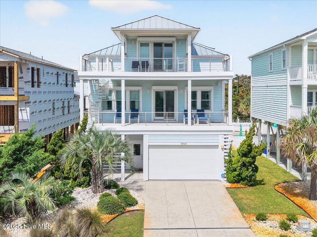 Photo of 7004 E Beach Drive, Oak Island, NC 28465 (MLS # 100530366)
