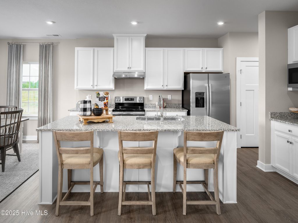 Photo of 4025 Farmfield Drive NE, Navassa, NC 28451 (MLS # 100535522)