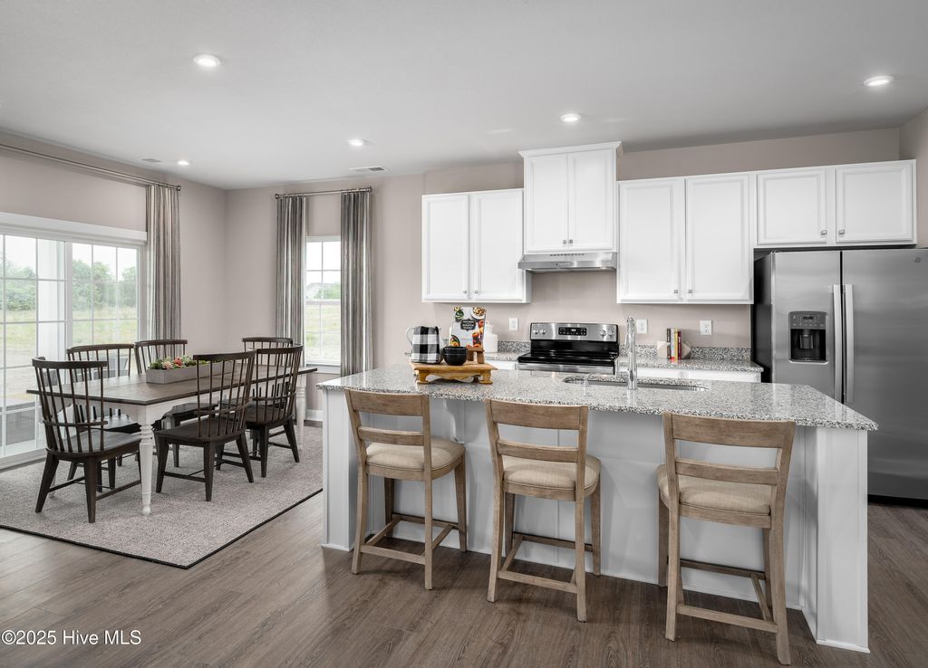 Photo of 4025 Farmfield Drive NE, Navassa, NC 28451 (MLS # 100535522)