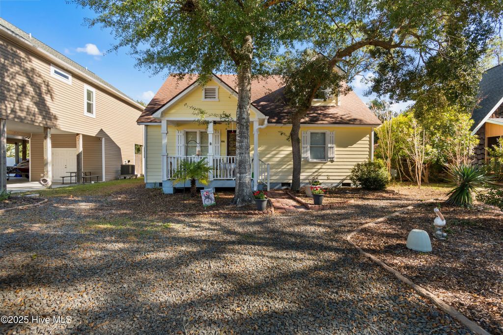 Photo of 166 NW 7th Street, Oak Island, NC 28465 (MLS # 100541656)