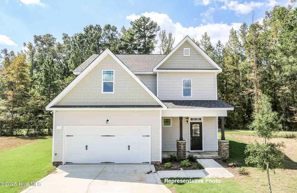 Photo of 653 Springtooth Drive, Zebulon, NC 27597 (MLS # 100527606)