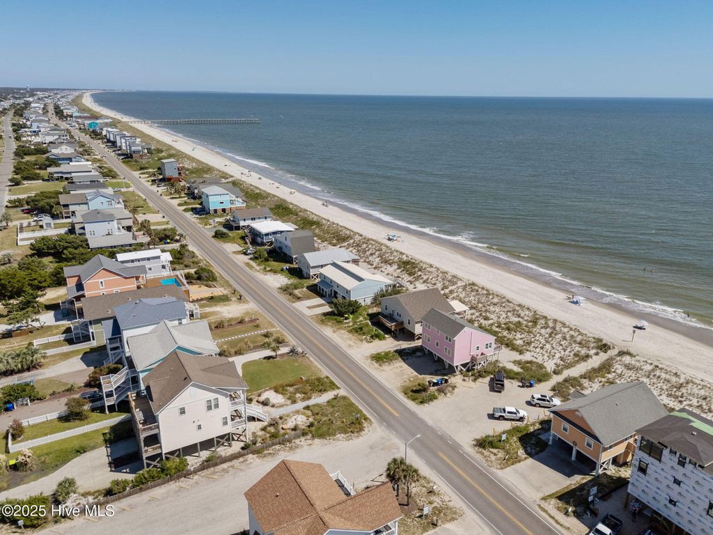 Photo of 601 E Beach Drive, Oak Island, NC 28465 (MLS # 100528926)