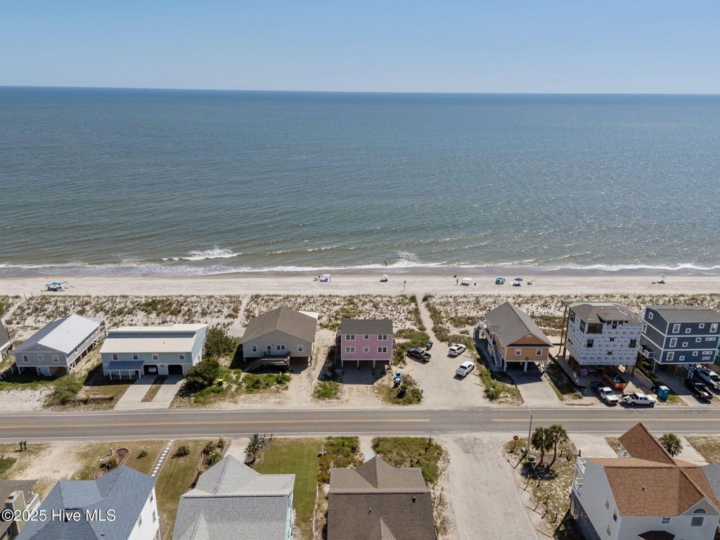 Photo of 601 E Beach Drive, Oak Island, NC 28465 (MLS # 100528926)