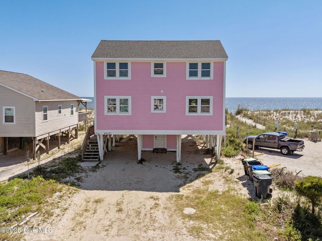 Photo of 601 E Beach Drive, Oak Island, NC 28465 (MLS # 100528926)