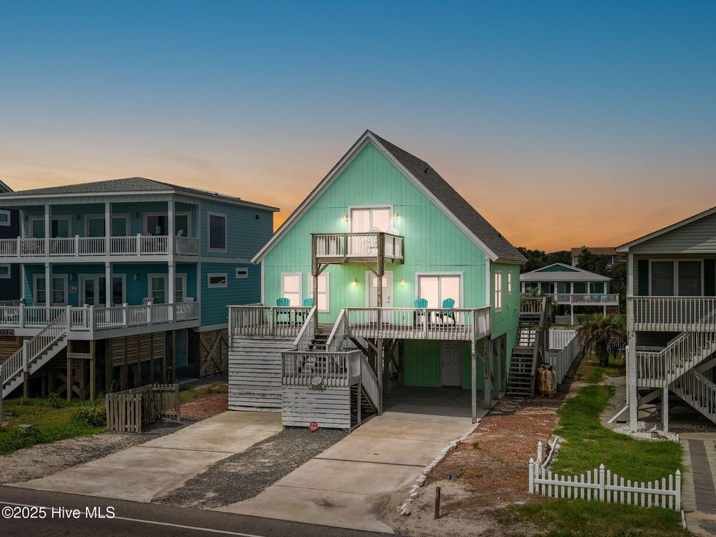 Photo of 1414 E Beach Drive, Oak Island, NC 28465 (MLS # 100526818)