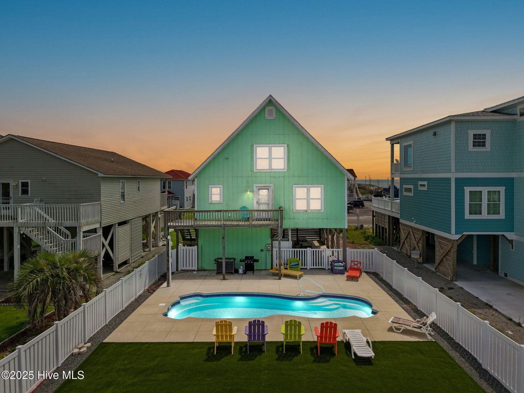 Photo of 1414 E Beach Drive, Oak Island, NC 28465 (MLS # 100526818)