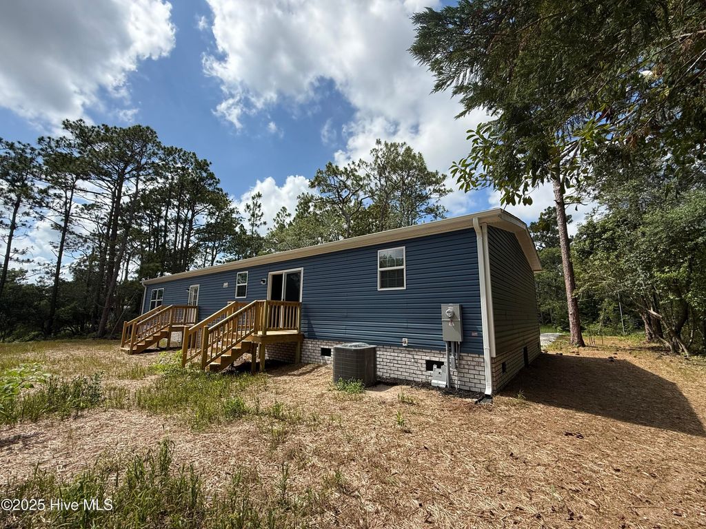 Photo of 1172 Greenbay Road, Southport, NC 28461 (MLS # 100518678)