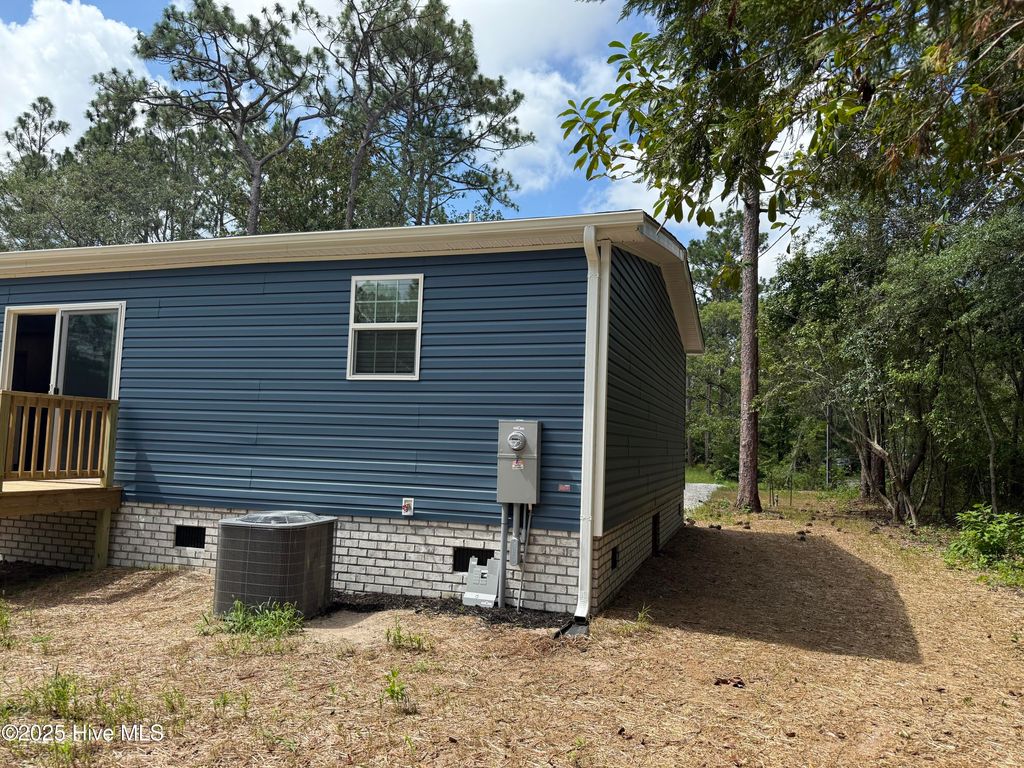 Photo of 1172 Greenbay Road, Southport, NC 28461 (MLS # 100518678)