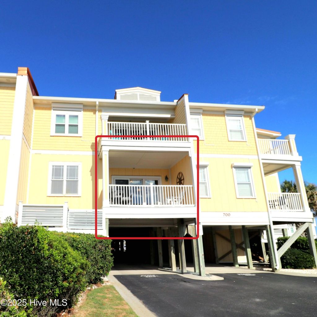 Photo of 700 Ocean Drive #Unit 110, Oak Island, NC 28465 (MLS # 100530472)