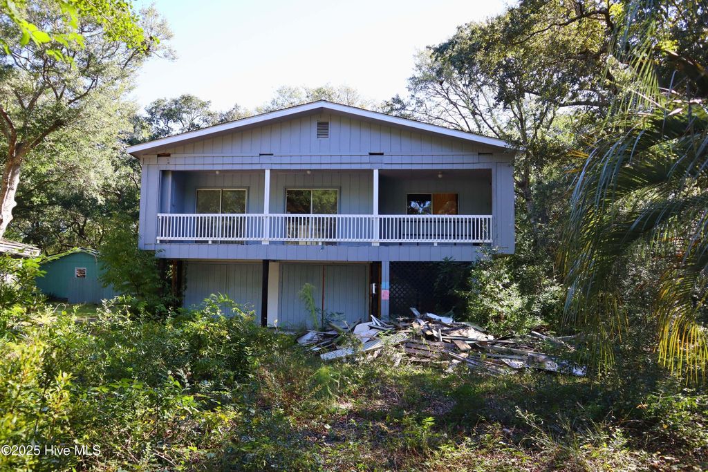 Photo of 116 SW 6th Street, Oak Island, NC 28465 (MLS # 100537469)