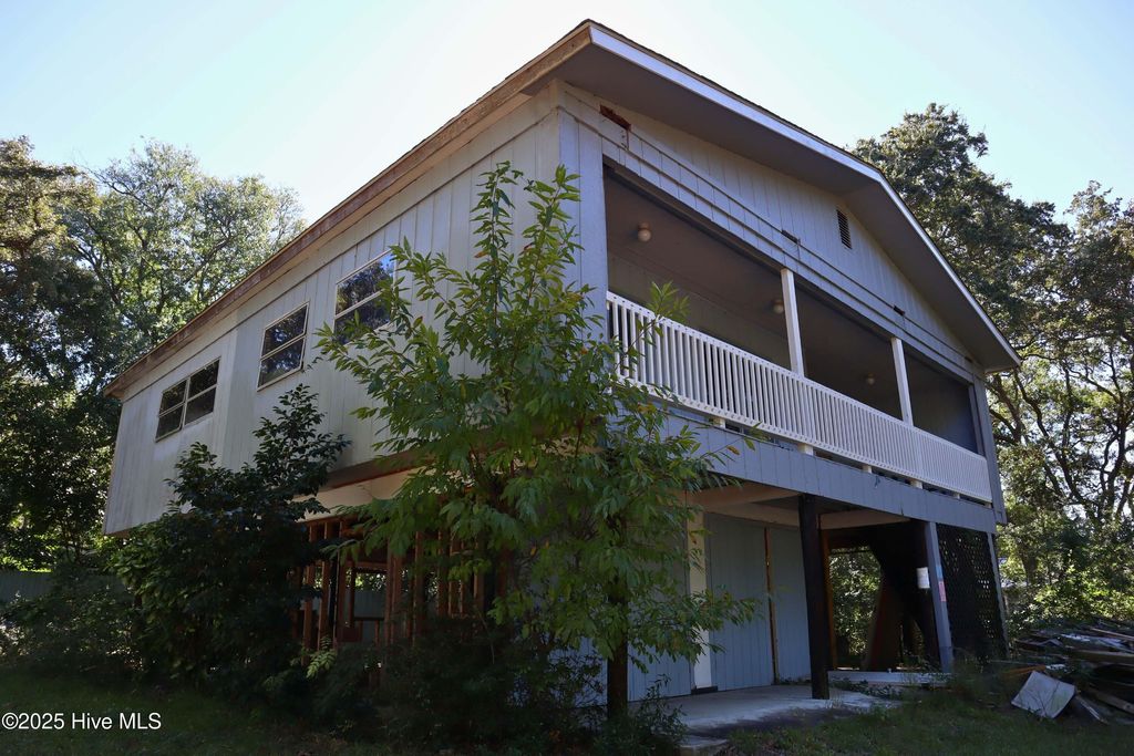 Photo of 116 SW 6th Street, Oak Island, NC 28465 (MLS # 100537469)