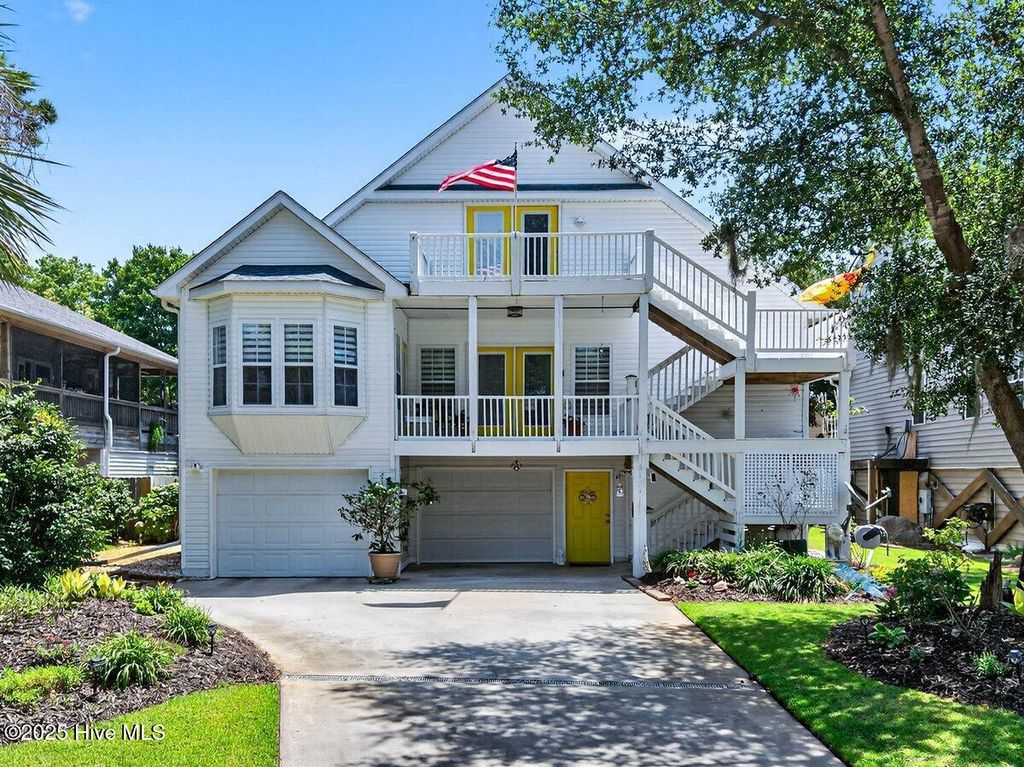 Photo of 104 NE 27th Street, Oak Island, NC 28465 (MLS # 100514945)