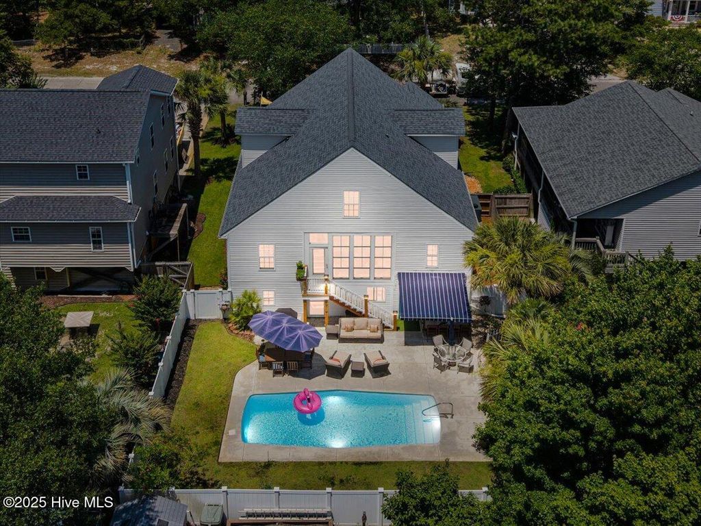 Photo of 104 NE 27th Street, Oak Island, NC 28465 (MLS # 100514945)