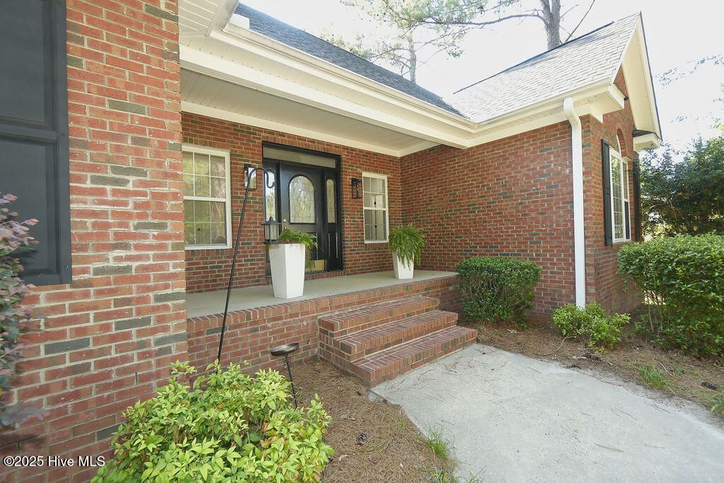 Photo of 145 Royal Woods Way, Whispering Pines, NC 28327 (MLS # 100539233)