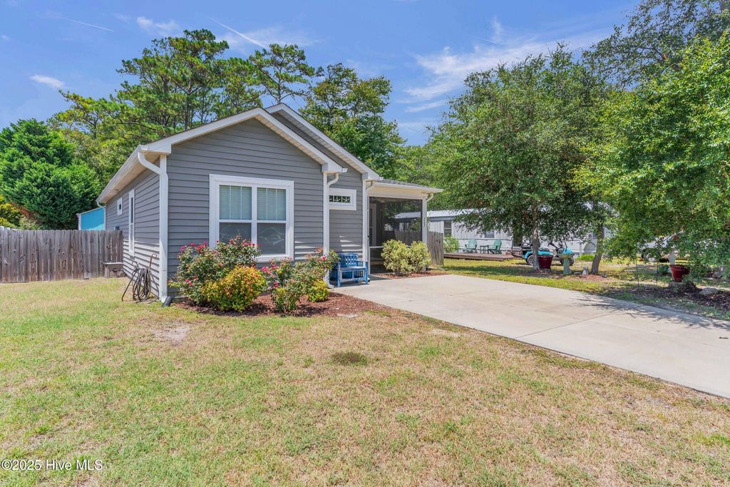 Photo of 207 NE 67th Street, Oak Island, NC 28465 (MLS # 100521768)