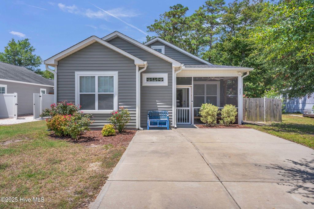 Photo of 207 NE 67th Street, Oak Island, NC 28465 (MLS # 100521768)