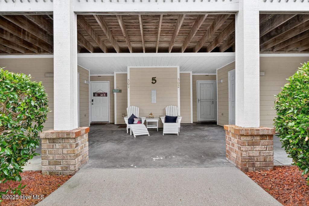 Photo of 3350 Club Villas Drive #502, Southport, NC 28461 (MLS # 100526427)