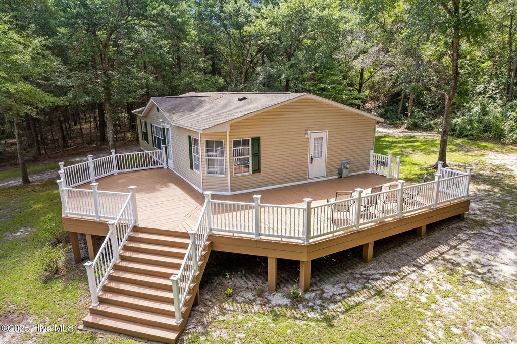 Photo of 930 Cypress Lakes Circle SE, Bolivia, NC 28422 (MLS # 100515279)