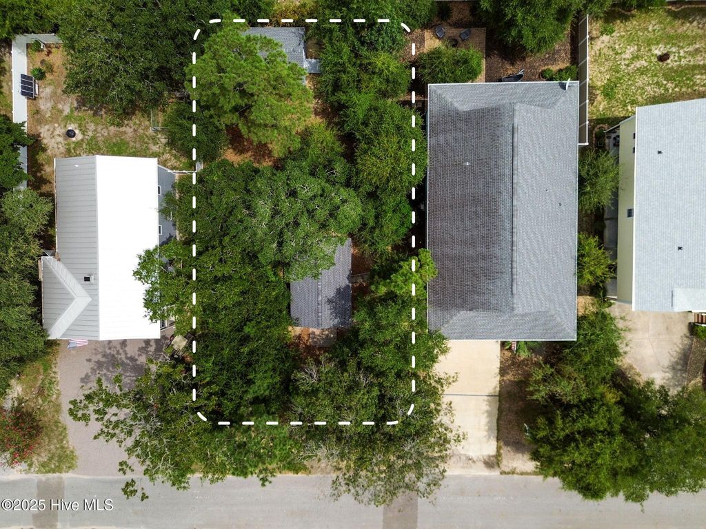 Photo of 55 NE 6th Street, Oak Island, NC 28465 (MLS # 100526497)