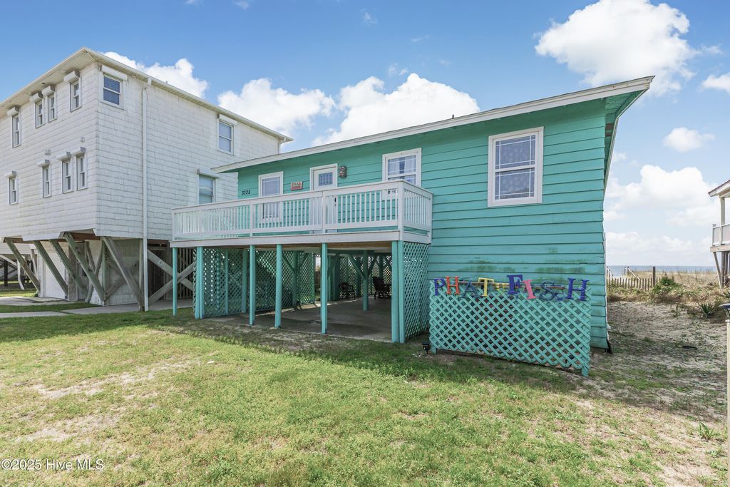 Photo of 3325 W Beach Drive, Oak Island, NC 28465 (MLS # 100498643)