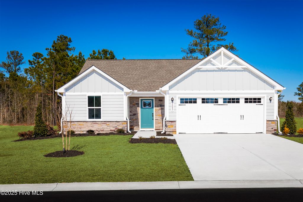 Photo of 4065 Farmfield Drive, Navassa, NC 28451 (MLS # 100523920)