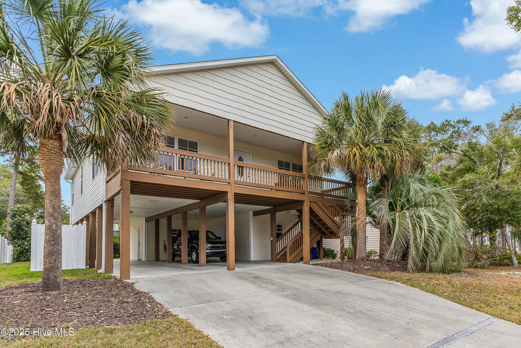 Photo of 335 NE 43rd Street, Oak Island, NC 28465 (MLS # 100543216)