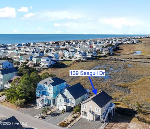 Photo of 139 Seagull Drive, Holden Beach, NC 28462 (MLS # 100541984)