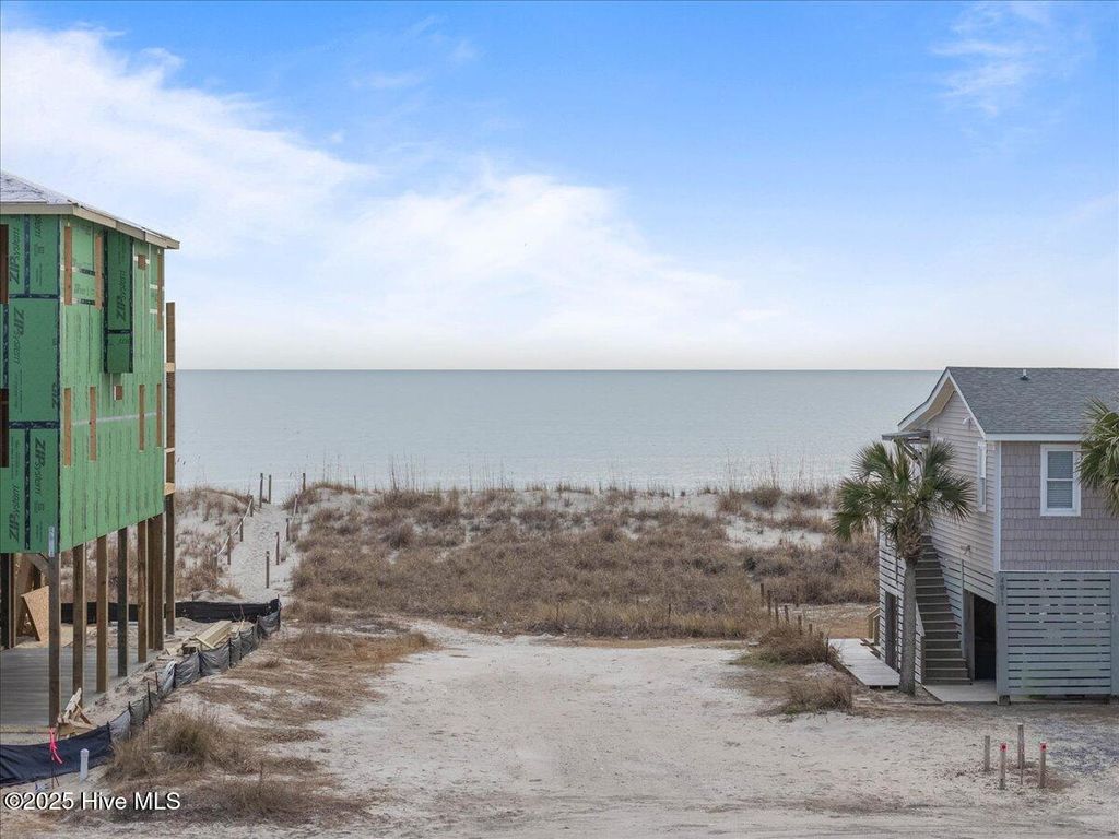 Photo of 4913 E Beach Drive, Oak Island, NC 28465 (MLS # 100488700)