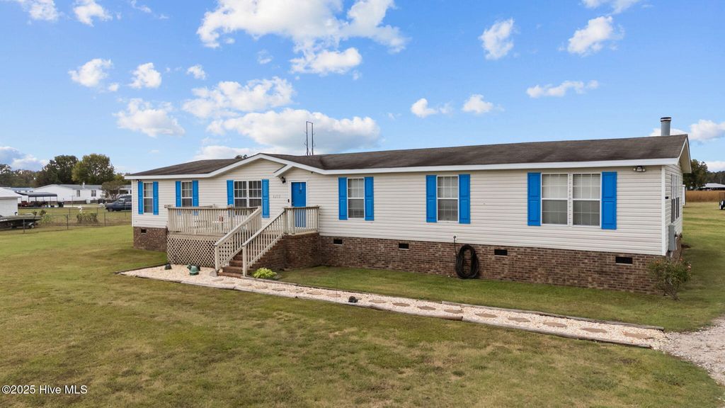 Photo of 6215 Coachlight Road, Elm City, NC 27822 (MLS # 100536444)