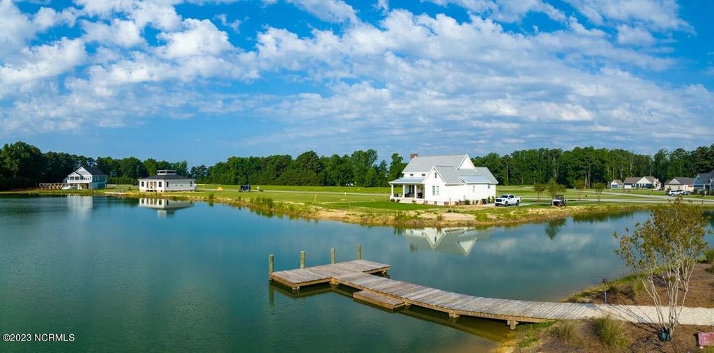 Photo of 494 W Burton Farm Drive, Minnesott Beach, NC 28510 (MLS # 100511461)