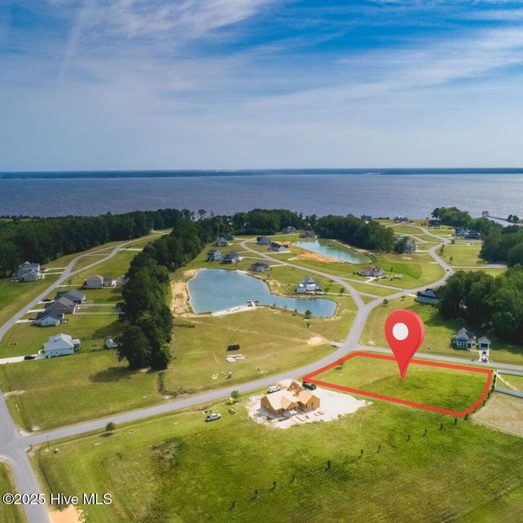 Photo of 494 W Burton Farm Drive, Minnesott Beach, NC 28510 (MLS # 100511461)