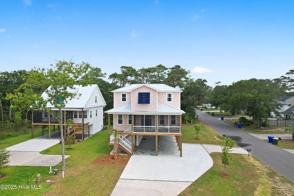 Photo of 3108 E Oak Island Drive, Oak Island, NC 28465 (MLS # 100544300)