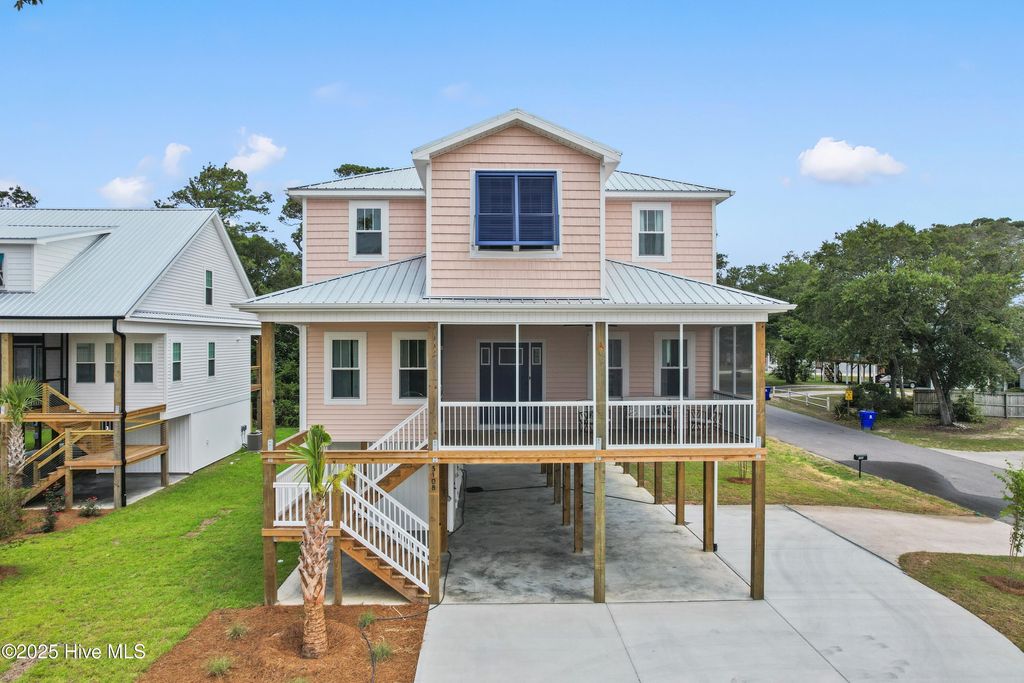 Photo of 3108 E Oak Island Drive, Oak Island, NC 28465 (MLS # 100544300)