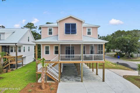 Photo of 3108 E Oak Island Drive, Oak Island, NC 28465 (MLS # 100544300)