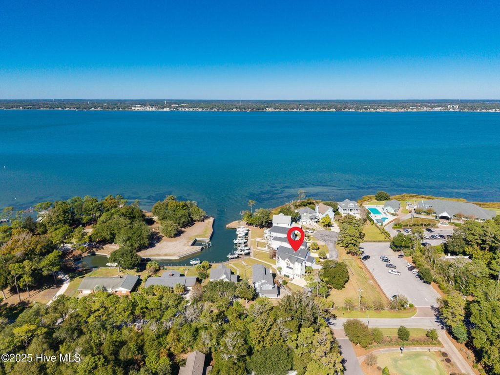 Photo of 107 Bogue Pines Circle, Pine Knoll Shores, NC 28512 (MLS # 100537943)