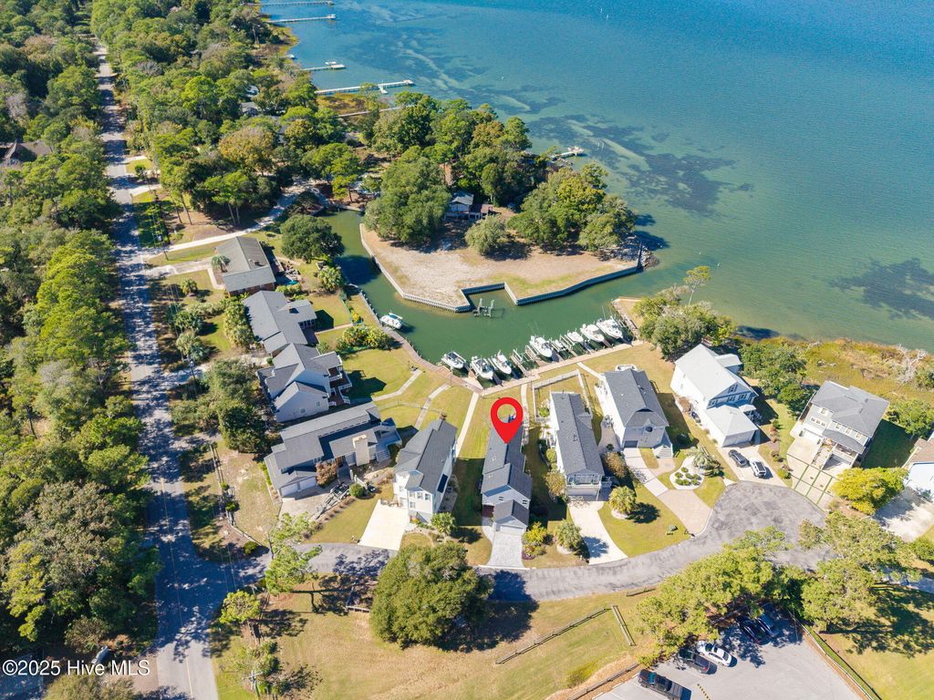 Photo of 107 Bogue Pines Circle, Pine Knoll Shores, NC 28512 (MLS # 100537943)