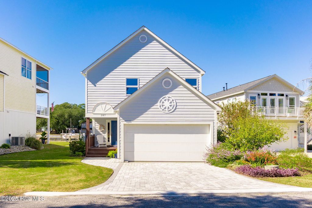 Photo of 107 Bogue Pines Circle, Pine Knoll Shores, NC 28512 (MLS # 100537943)