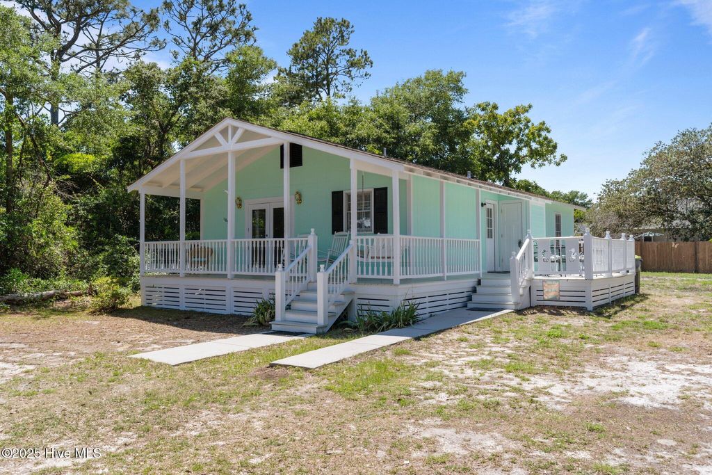 Photo of 109 NE 17th Street, Oak Island, NC 28465 (MLS # 100494109)