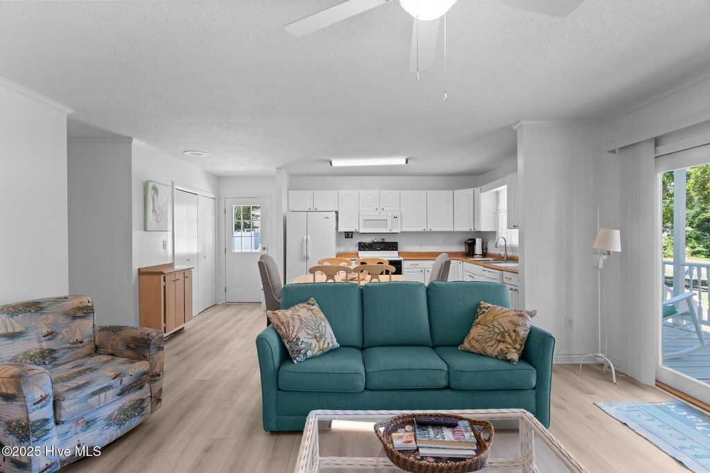 Photo of 109 NE 17th Street, Oak Island, NC 28465 (MLS # 100494109)