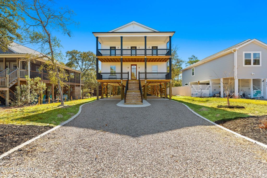 Photo of 403 E Oak Island Drive, Oak Island, NC 28465 (MLS # 100502712)