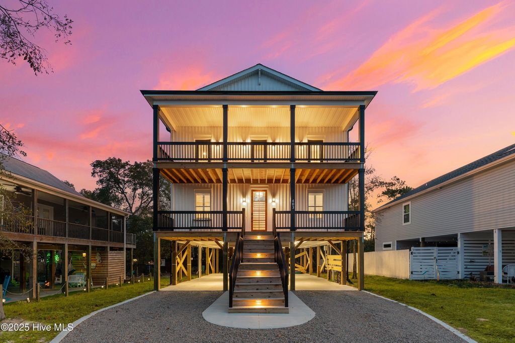 Photo of 403 E Oak Island Drive, Oak Island, NC 28465 (MLS # 100502712)