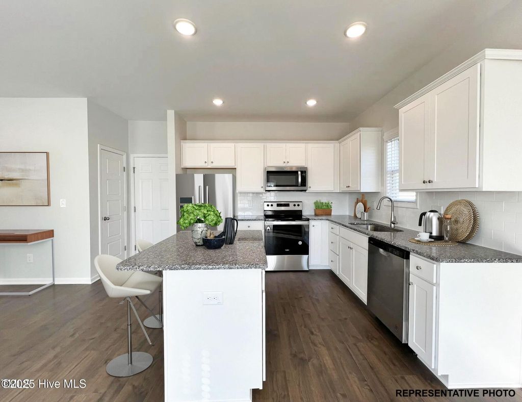 Photo of 725 Springtooth Drive, Zebulon, NC 27597 (MLS # 100530415)