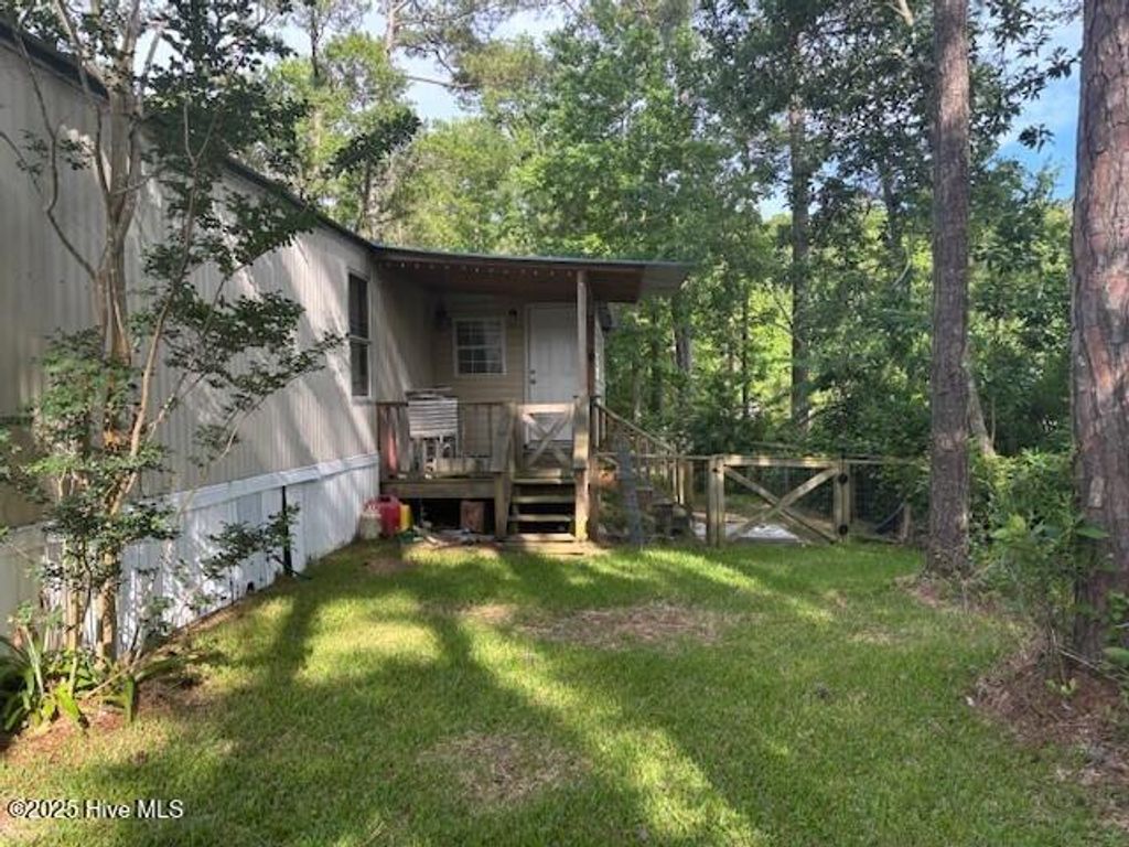 Photo of 212 Whispering Pines Court, Hampstead, NC 28443 (MLS # 100526392)